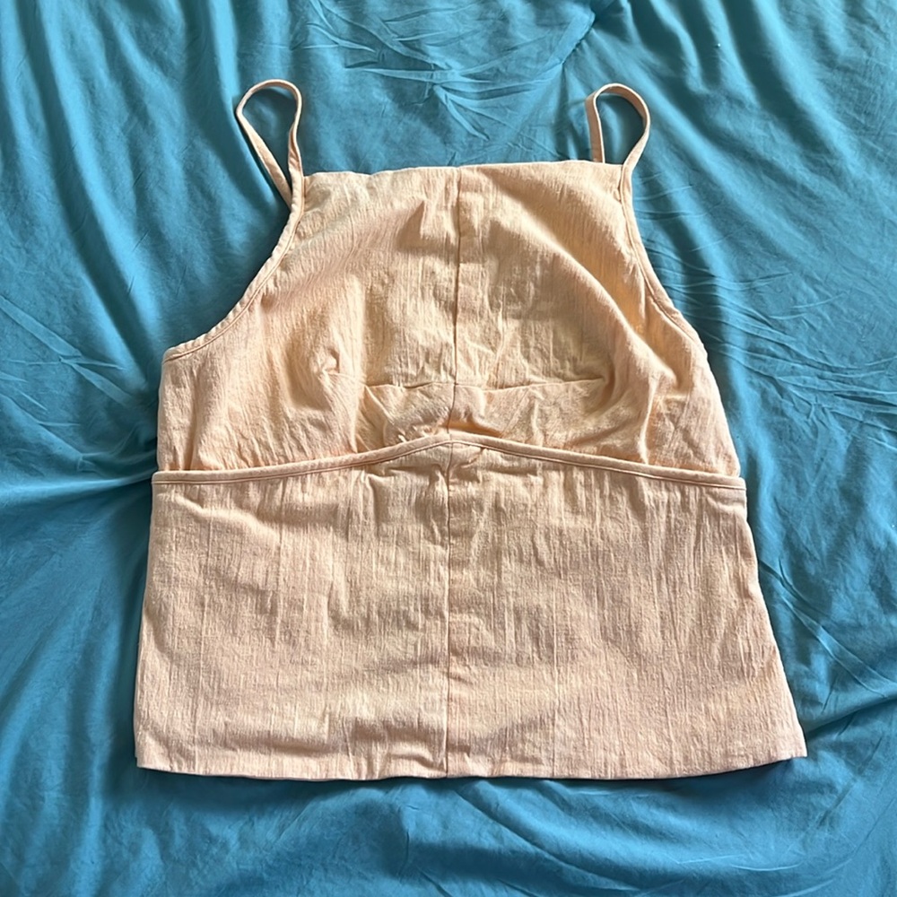 Free People Tank. Cream orange color